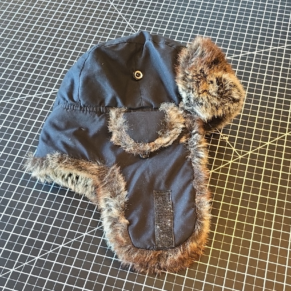 Mens Weatherproof fur winter hat with fur ear protection. Only used a few times.